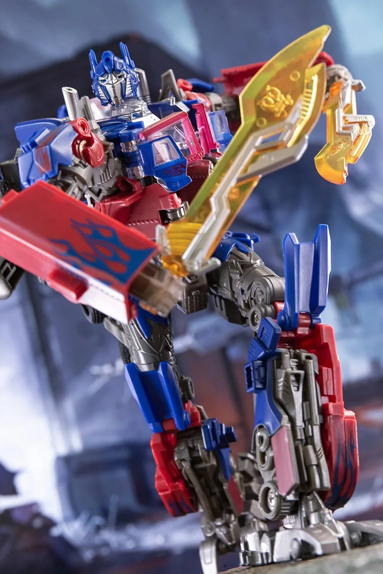 Figura Transformers Optimus Prime Llamas Turquesa — Camión Articulado TW1022