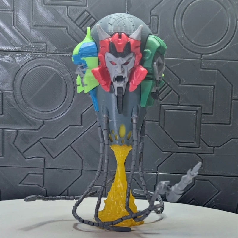 Busto Transformers Demonio Multicolor — Criatura de Cinco Caras Edición Prestigio