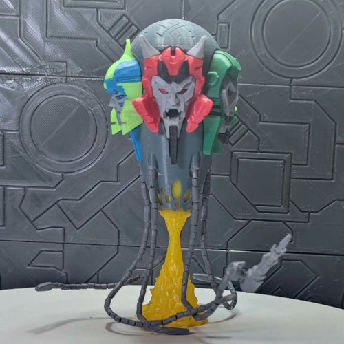 Busto Transformers Demonio Multicolor — Criatura de Cinco Caras Edición Prestigio