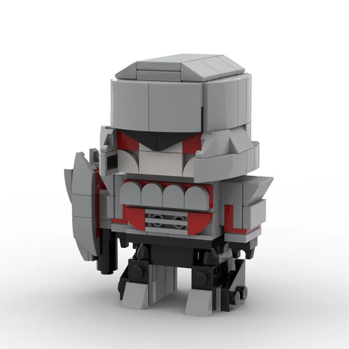 Figura Transformers Megatron Versión IDW Chibi — Ladrillo Gris y Rojo Cañón de Fusión