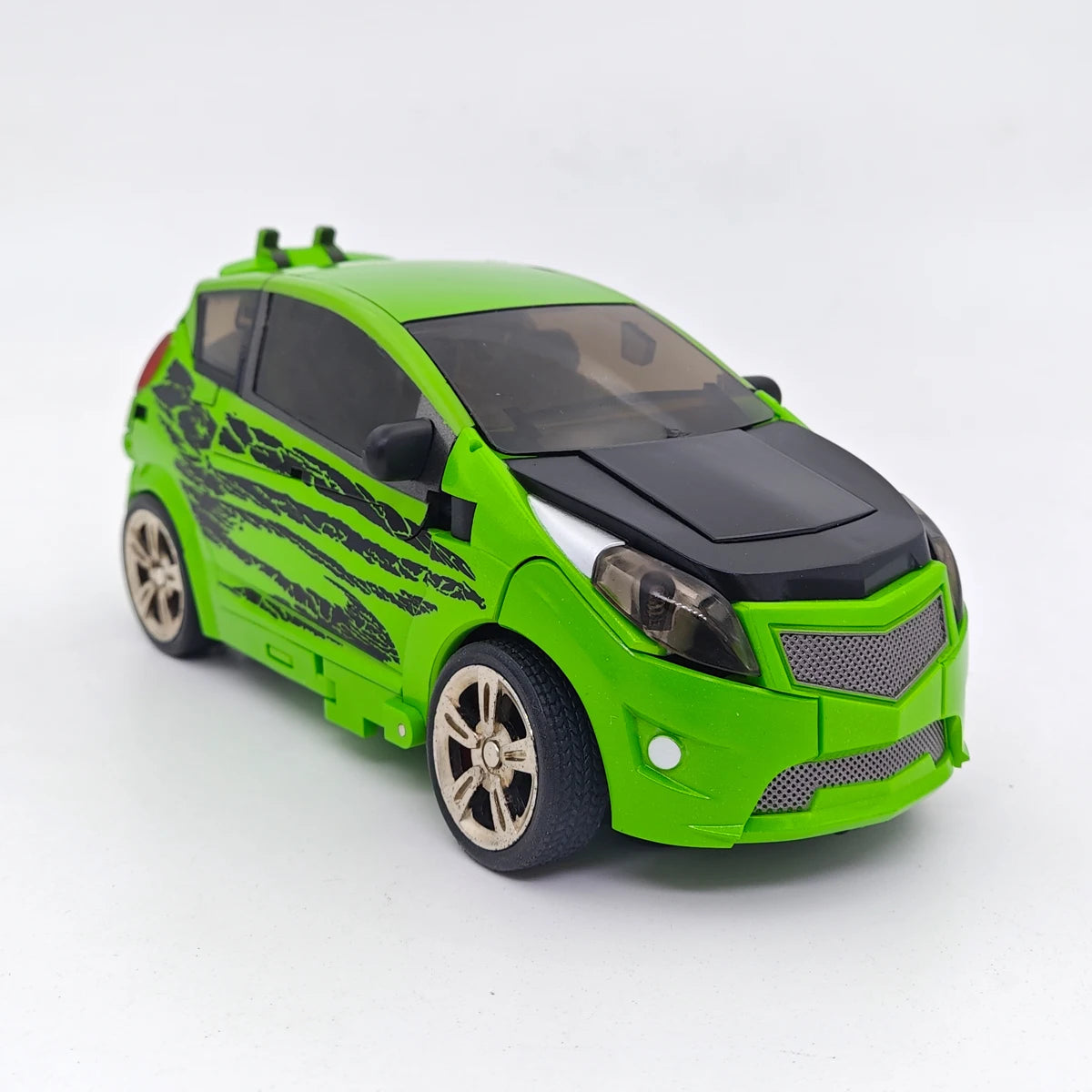 Figura Transformers Skids y Mudflap — Dúo Gemelo Verde Tonto Unique Toys